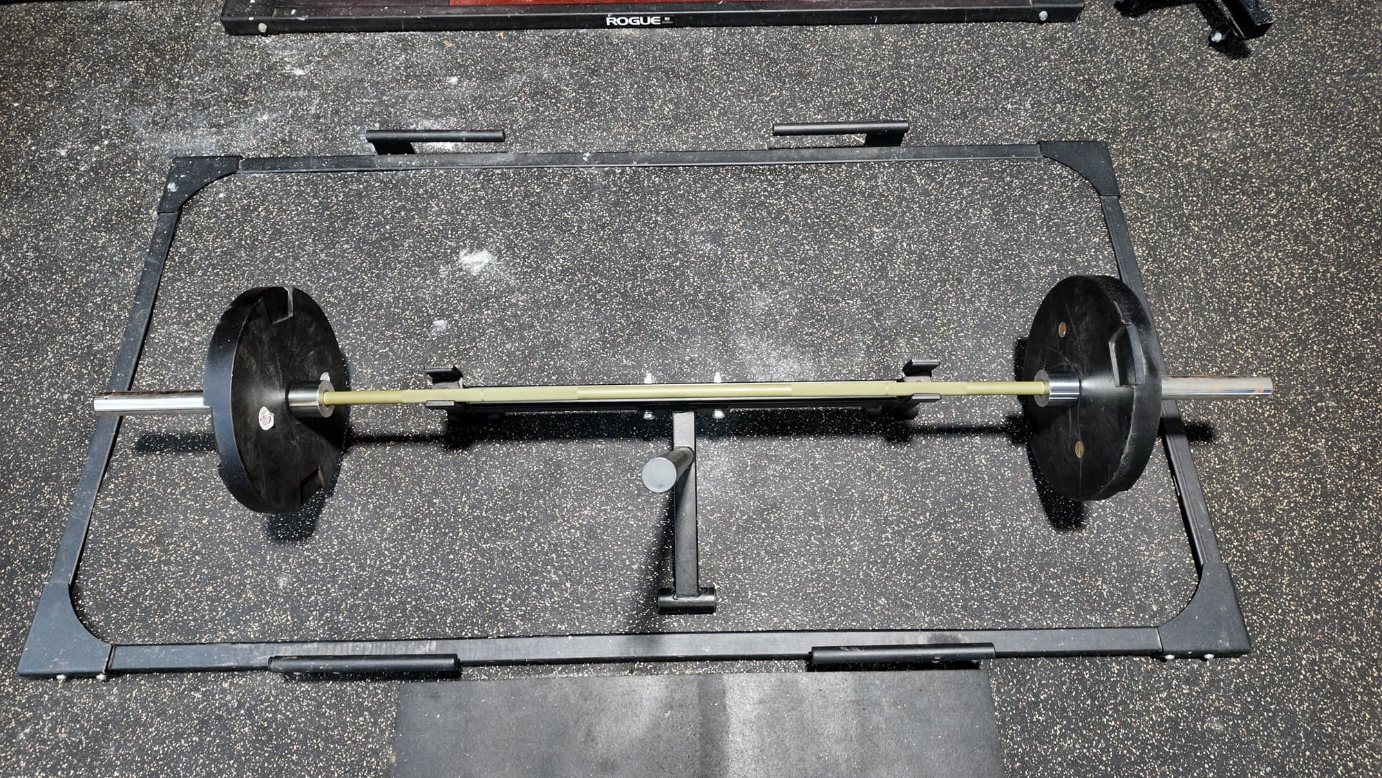 Overhead view of a loaded barbell on the deadlift platform