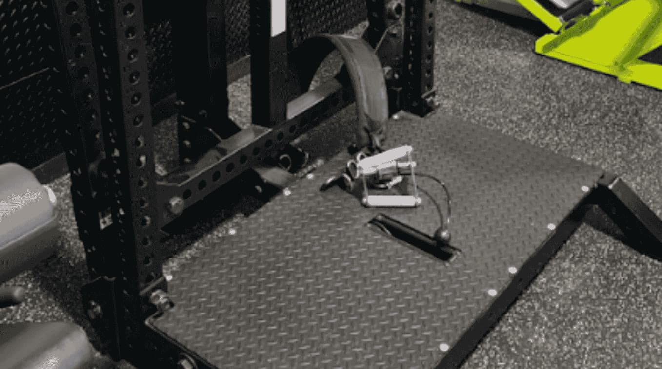 Rogue Rhino belt squat machine with a diamond-plate platform